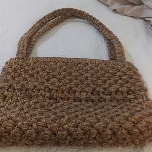 Woman macrame shoulder bag in brown tan color with 2 rows beads in middle